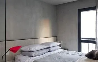 Revestimento cimentício confere visual moderno a apartamento
